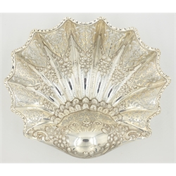  Edwardian silver shell dish, pierced and repoussdecorated with flowers and raised on three shell form feet by Atkin Brothers Sheffield 1905 approx 10oz  