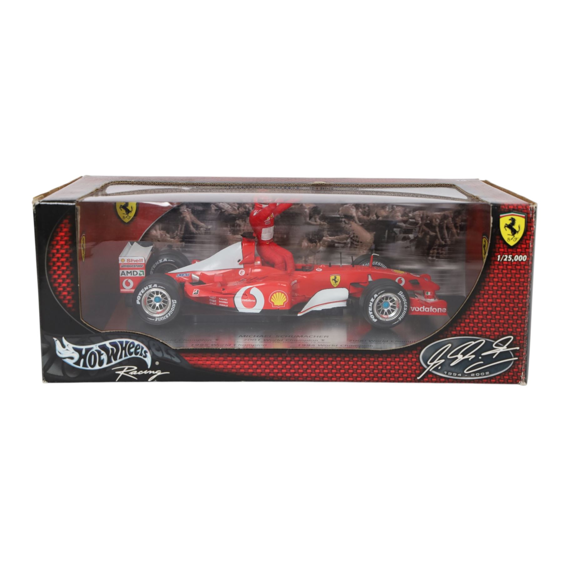 Signed Michael Schumacher Hot Wheels Ferrari 1:18 scale model, 2002 five-times World Champion edition depicting Schumacher sitting on the side of his car with arms raised, with his signature in black marker to wing of car, boxed