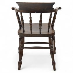 Early 20th century smokers bow armchair, shaped and curved top rail over turned spindles and open arms with rounded terminals, shaped elm seat on turned supports