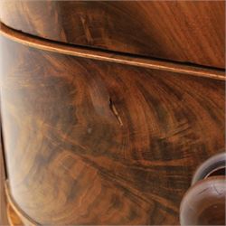 Victorian mahogany bow fronted chest, fitted with two short and three long drawers, flame mahogany front, bone escutcheons and turned wooden handles, quarter barley twist columns, raised on turned supports