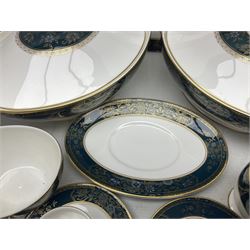 Royal Doulton Carlisle pattern dinner service for eight, to include dinner plates, side plates, soup bowls, dessert plates, two covered tureens, sauce boat and saucers etc