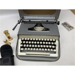 Kundo quartz clock, miniature brass clocks, two barometers, Sony digital camera, Nokia phone, Monarch Remington typewriter, commemorative Shilling etc