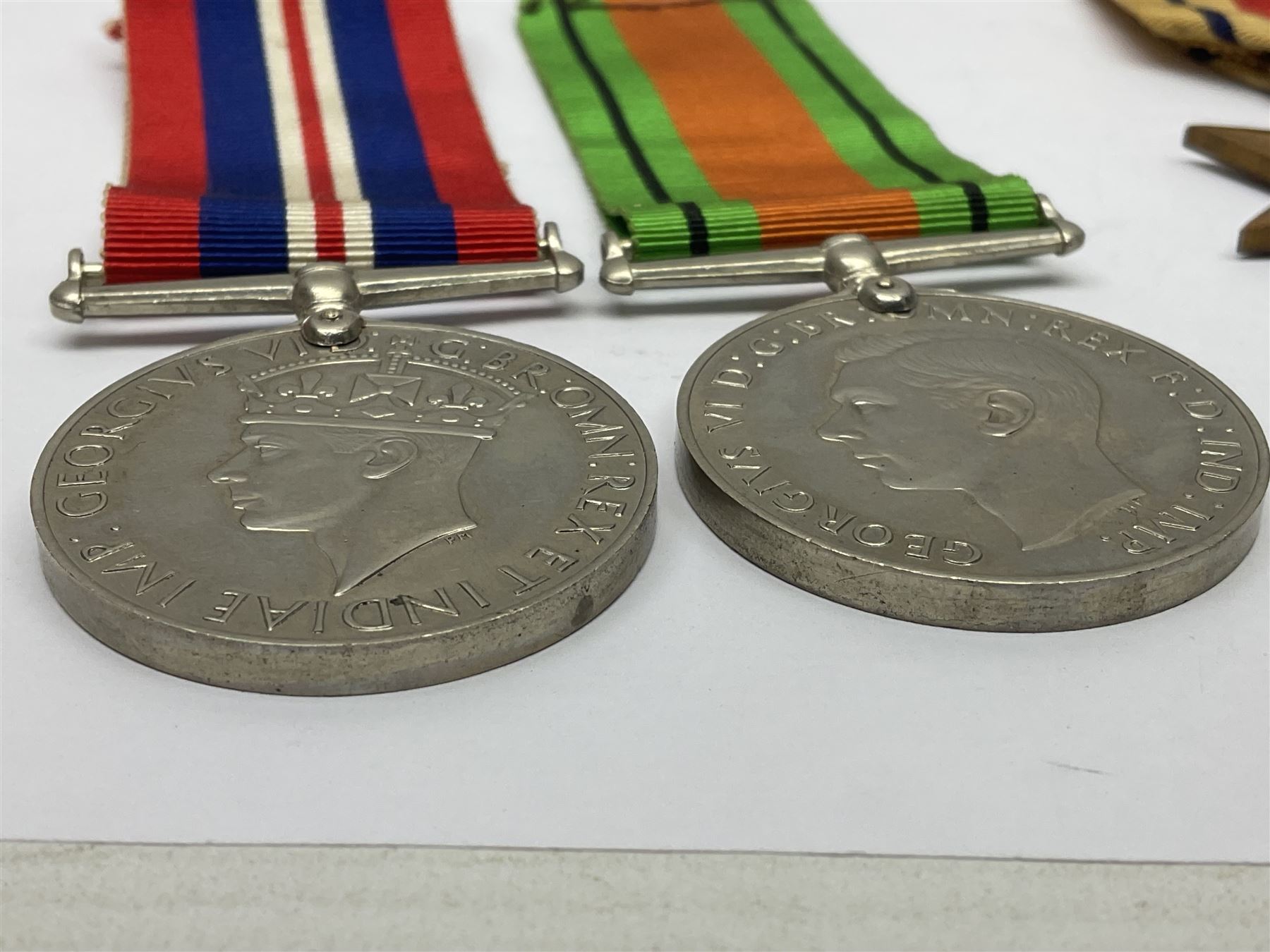 Group of five WWII medals comprising 1939-45 War Medal, Defence Medal and Italy, Africa and 1939-45 Stars; all with ribbons (5)