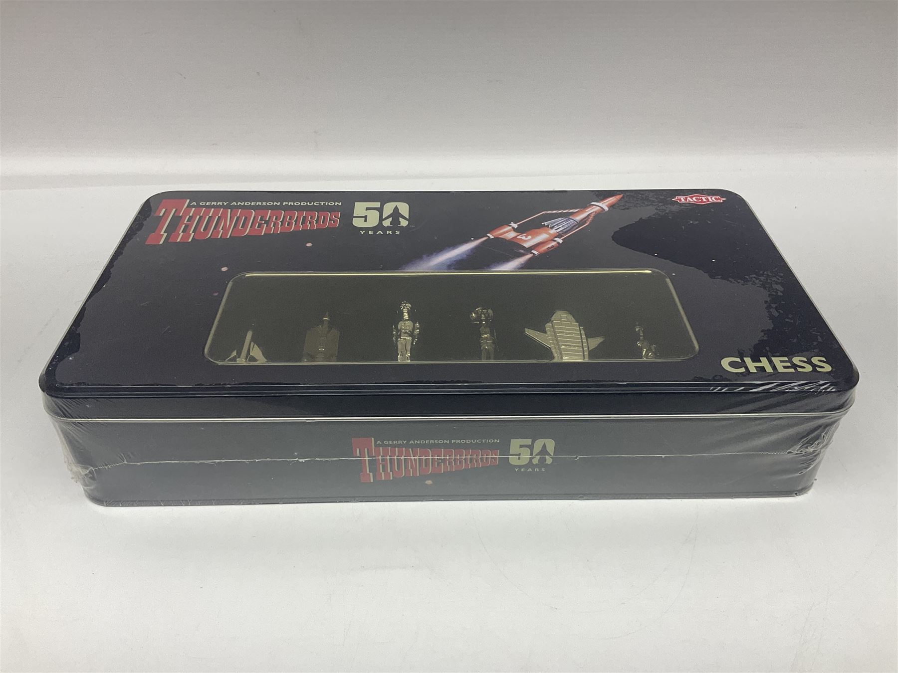 Thunderbirds collectables; Rimmer, S., ‘From Thunderbirds to Pterodactyls’ signed first edition hard back book with unclipped dust jacket; Thunderbirds 50th Anniversary limited edition Chess Set; Captain Scarlet talking keychain; Matchbox 1992 die-cast Thunderbird 1, 2, 3 and 4 models (7)