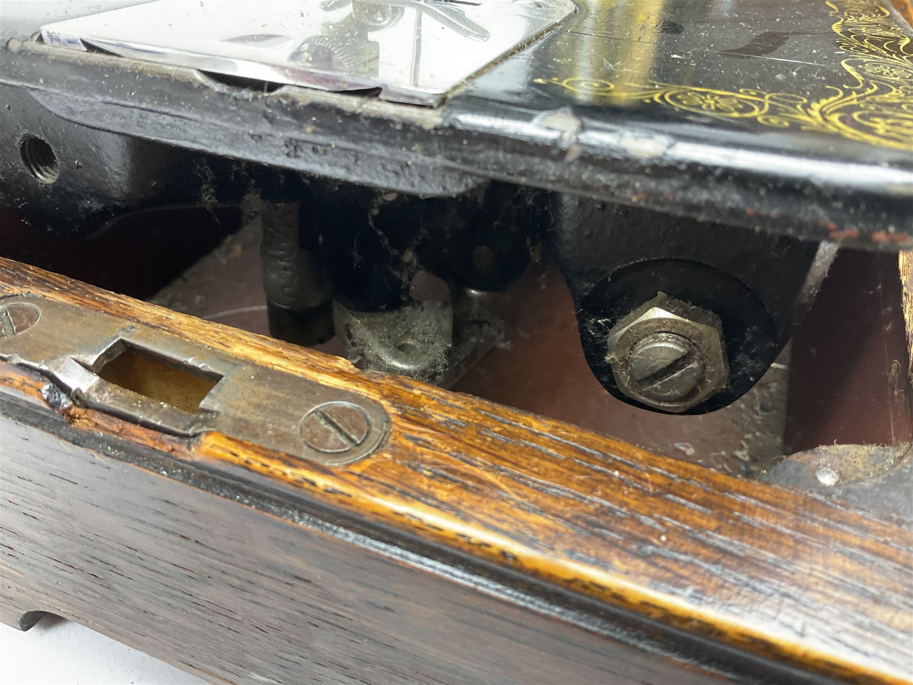 Singer sewing machine no. EA584046 in case (missing key) and Singer Manual of Family Sewing Machines