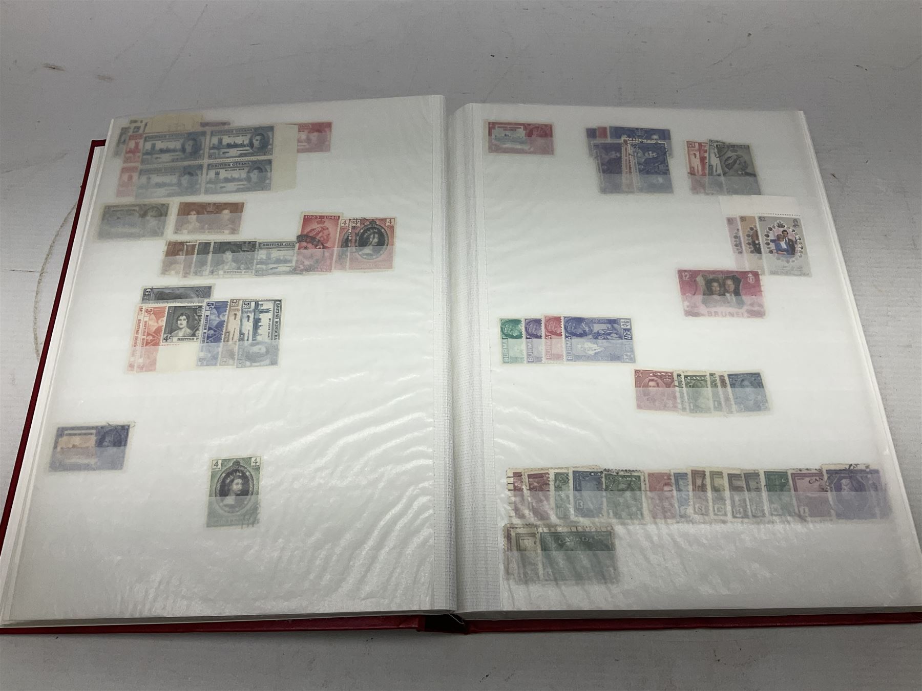 King George V Silver Jubilee stamps 1910-1935 including Bermuda marginal mint block of four, Virgin Islands marginal mint blocks of four including variations/errors, other similar blocks of four etc, various Royal Silver Wedding 1948 stamps, King George VI Victory 8th June 1946, Queen Elizabeth II Coronation etc, housed in a stockbook