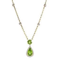 18ct gold peridot and diamond necklace, pear shaped peridot with diamond surround, suspended from a round brilliant cut peridot, on gold rubover set diamond chain, stamped 750, total peridot weight approx 4.65 carat