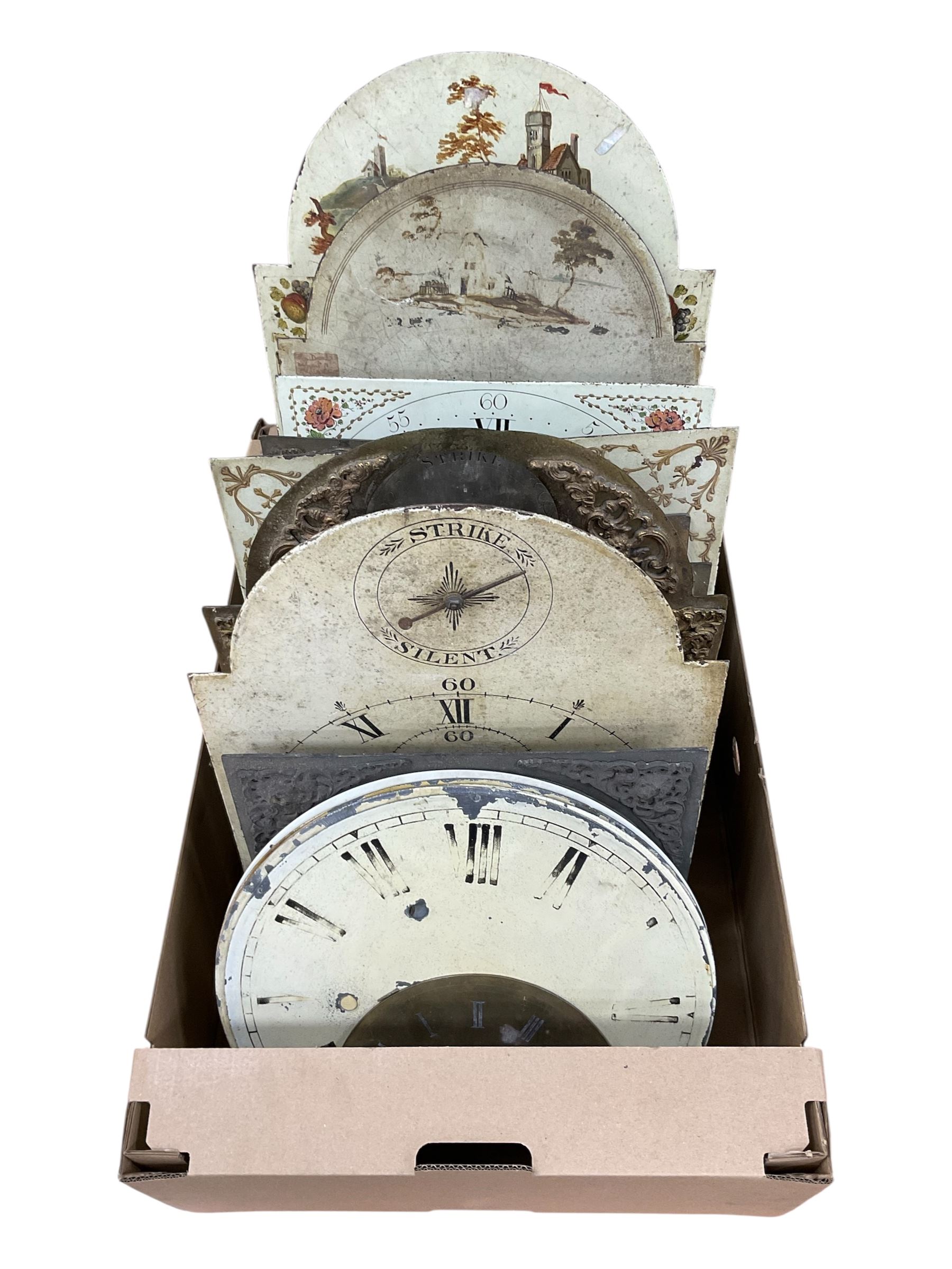 Approximately twenty-two longcase and wall clock dials, 18th century and later, included painted and brass examples