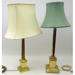  Large brass Corinthian Column table lamp with cream shade, H86cm and another similar brass table lamp with shade (2)  