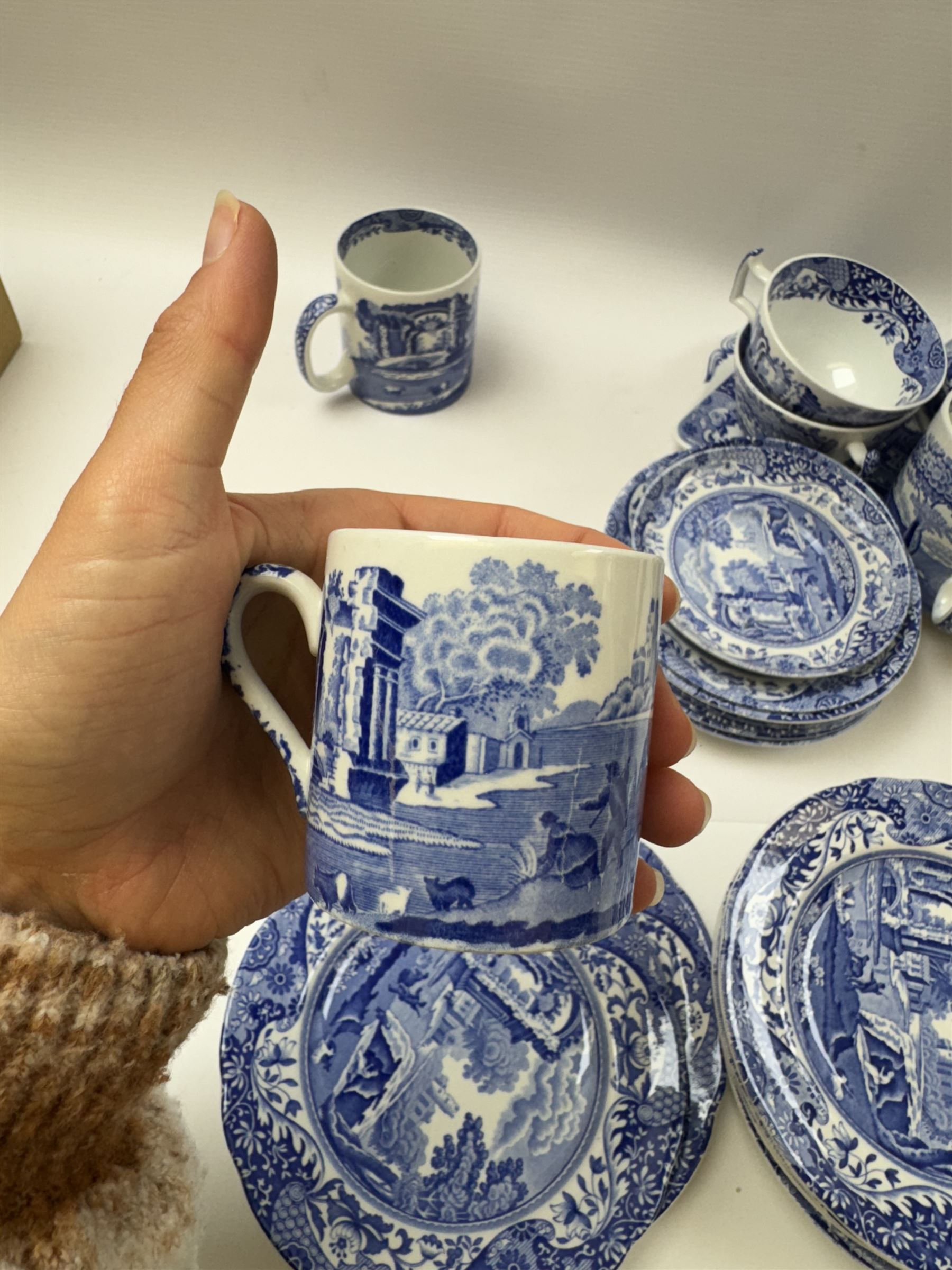 Spode Italian pattern tea service, comprising teapot, milk jug, open sucrier, six cups and saucers, two coffee cans and saucers, six dessert plates, four mugs and a sandwich plate (30) 