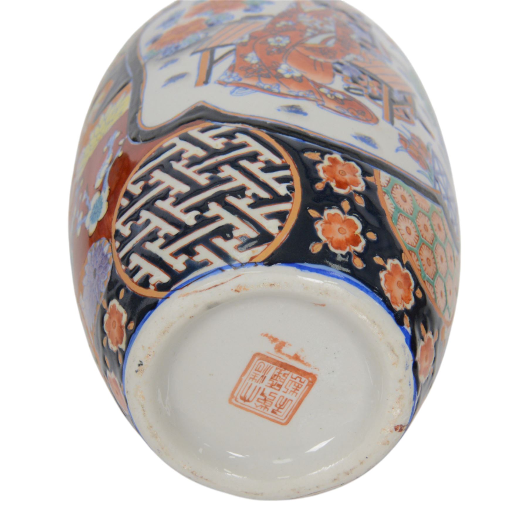 Pair of Japaneses imari vases, the central panel, decorated with figures in a landscape, together with famille rose vase, largest H37cm  