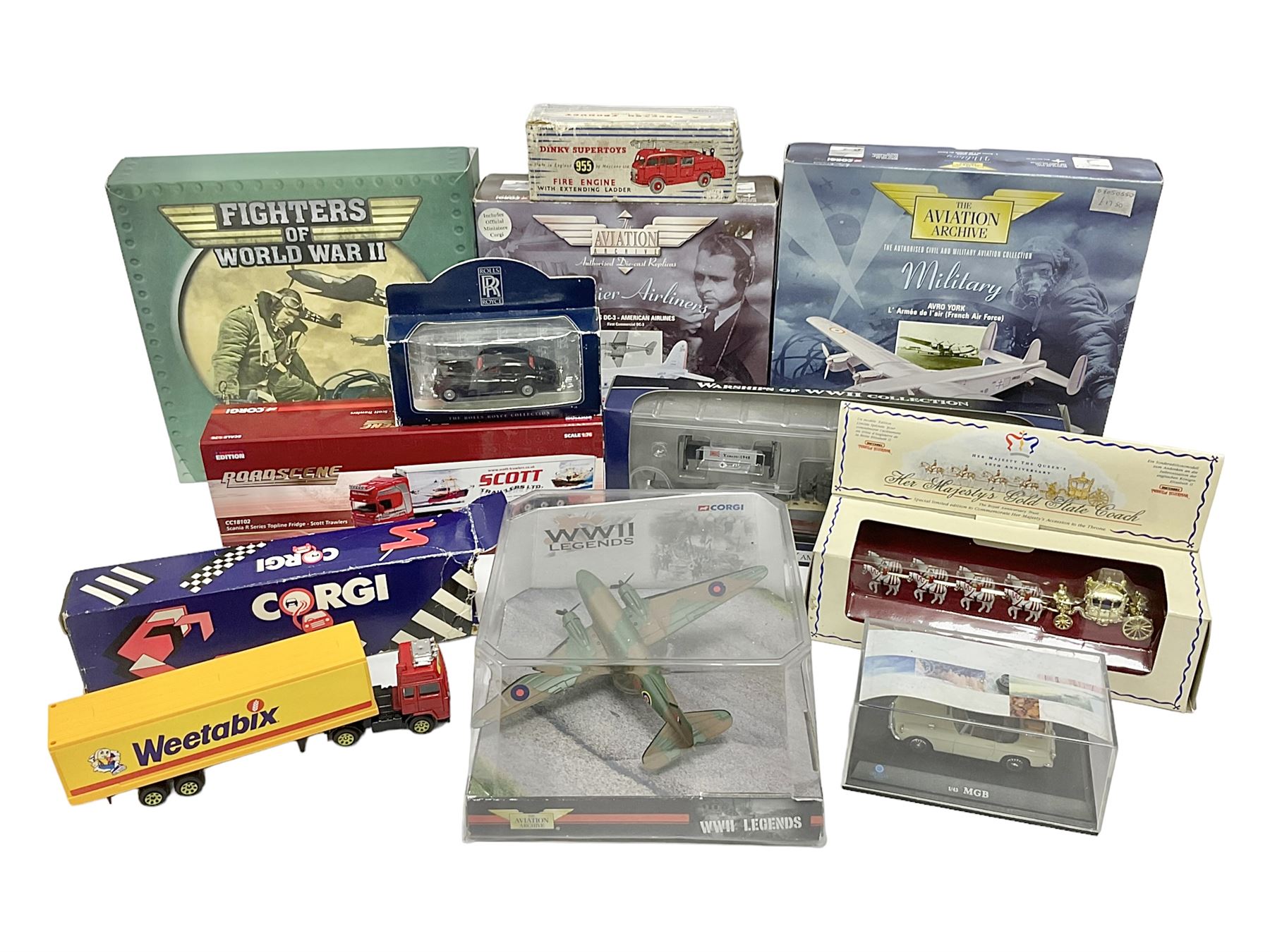 Eleven die-cast models from various makers to include Dinky 955 Fire Engine, missing ladder, boxed; Matchbox YY66 Her Majesty’s Gold State Coach; Corgi - CC18102 Scania R Series Toplone Fridge no.3474/3710; and further vehicles and aeroplanes to include Aviation Archive and Editions Atlas (11) 