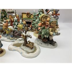 Large collection of Christmas themed Hummel figures and Hummel scapes by Goebel, to include Winter Friend, Making New Friends, Tree Trimming Time, Winter Adventure etc