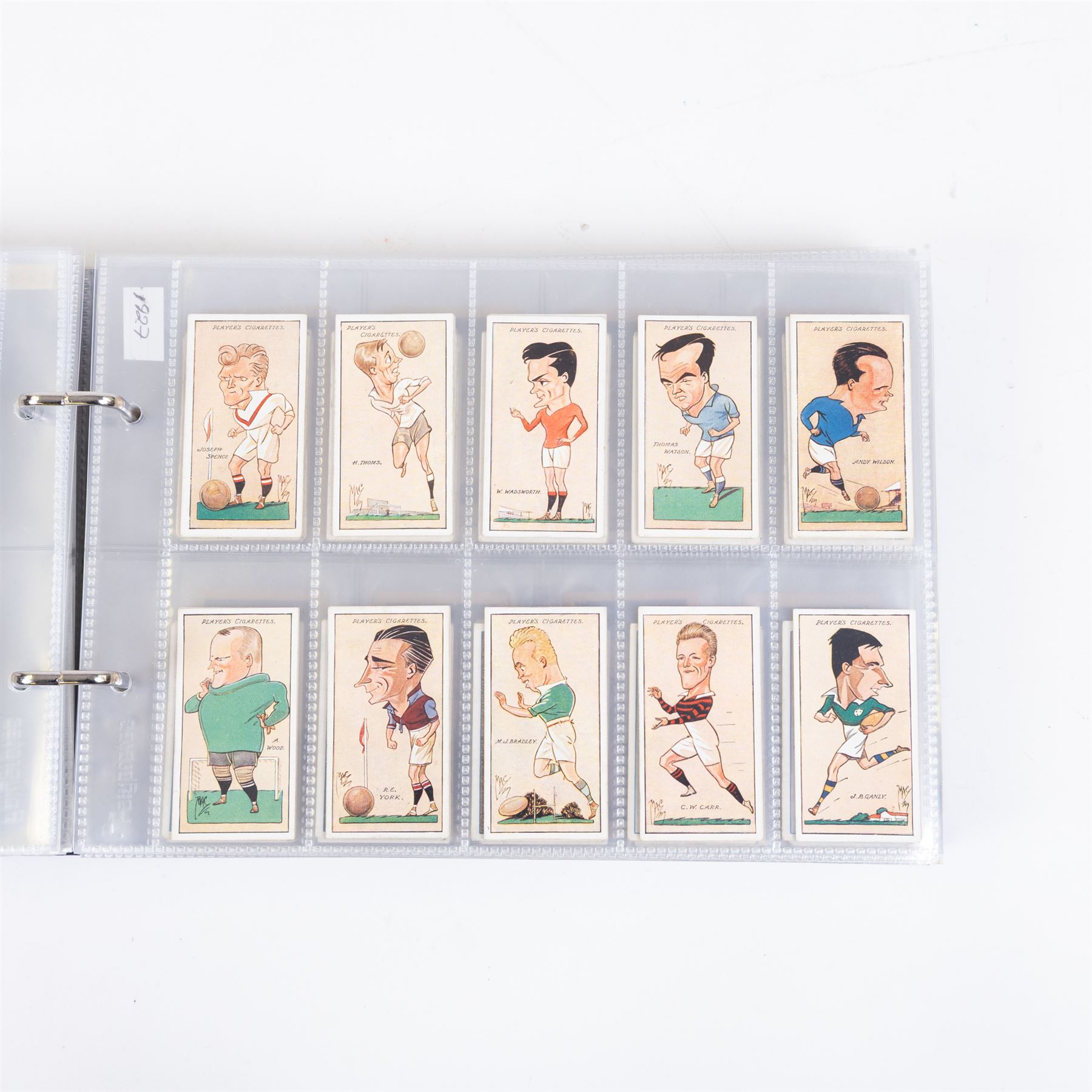 Collection of Edwardian and later Football related trading and cigarette cards, including forty-nine of fifty 1906 Ogden's Football Club Colours, 1922 PALS Footall series, ninety of one hundred 1925 Gallaher Famous Footballers, complete set of forty-four 1926 Ogden's Captains of Association Football Clubs and Colours, complete set of fifty 1927 Players Football Caricatures by MAC,  complete set of fifty 1927 Players Football Caricatures by RIP,  complete set of fifty 1930 Players Association Cup Winners, complete set of 50 1933 Ogdens AFC Nicknames etc, housed in brown cigarette card album