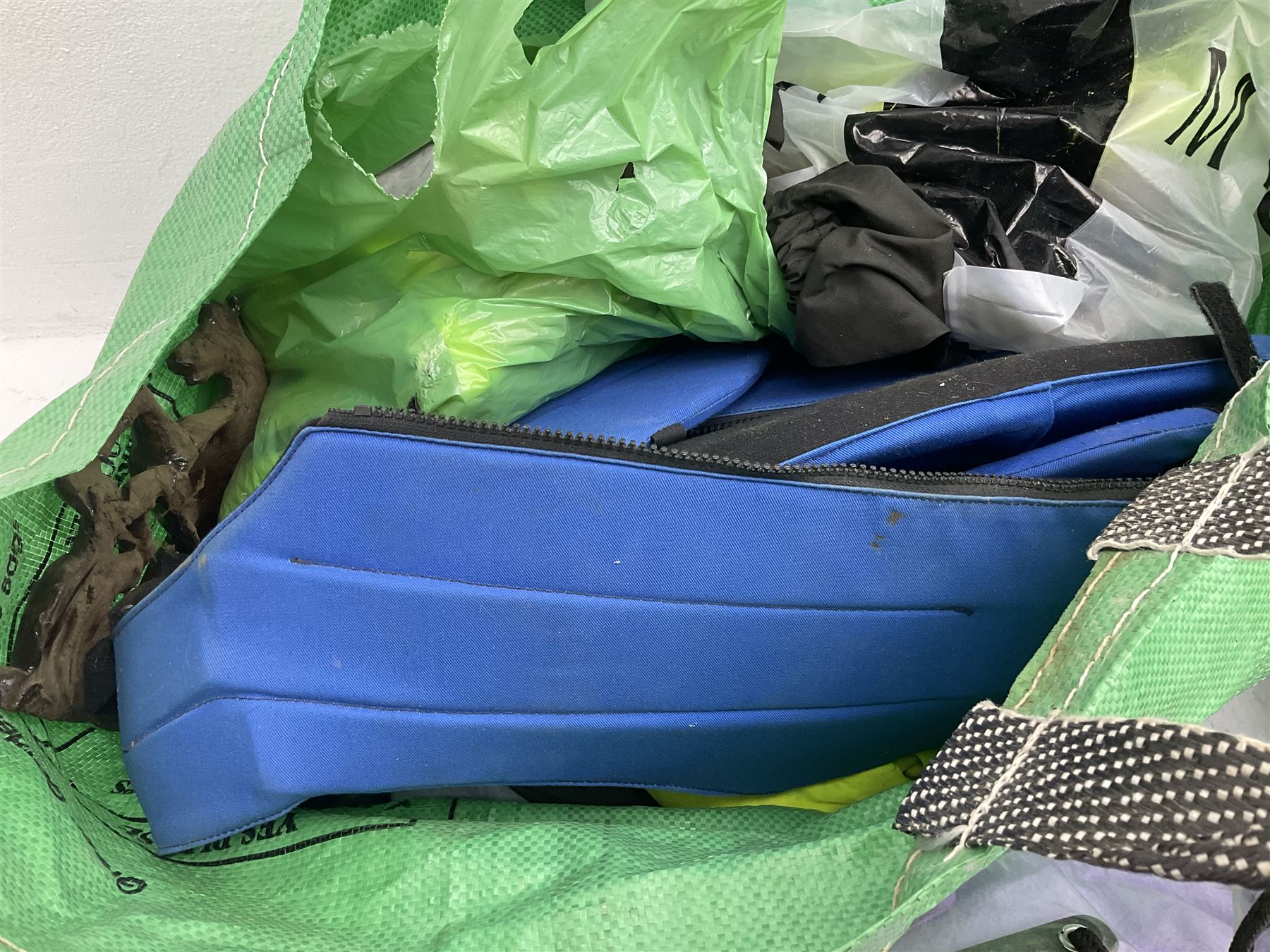 Quantity of horse tack and equipment to include Hauptner electric horse clippers, The Horseman Electric Clippers, bits, bridles, girths, rugs, jodpa boots etc  