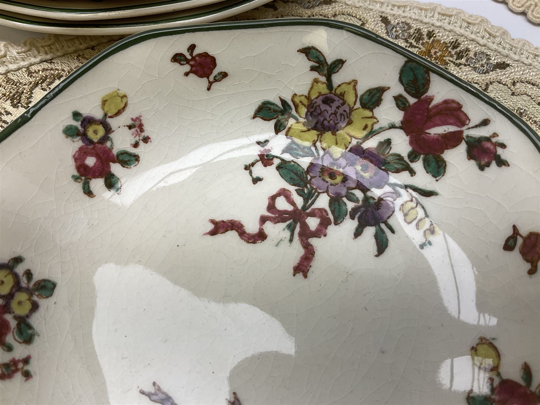 Royal Doulton part dinner service in Old Leeds Sprays pattern,  to include cheese dome, teapot and stand, egg cups etc, together with a selection of floral doilies.  