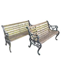 Pair of Victorian Revival Coalbrookdale design 'Dog and Serpent' pattern benches with slatted seats, the cast iron end supports of pierced and scrolling design with dog mask arm terminals
