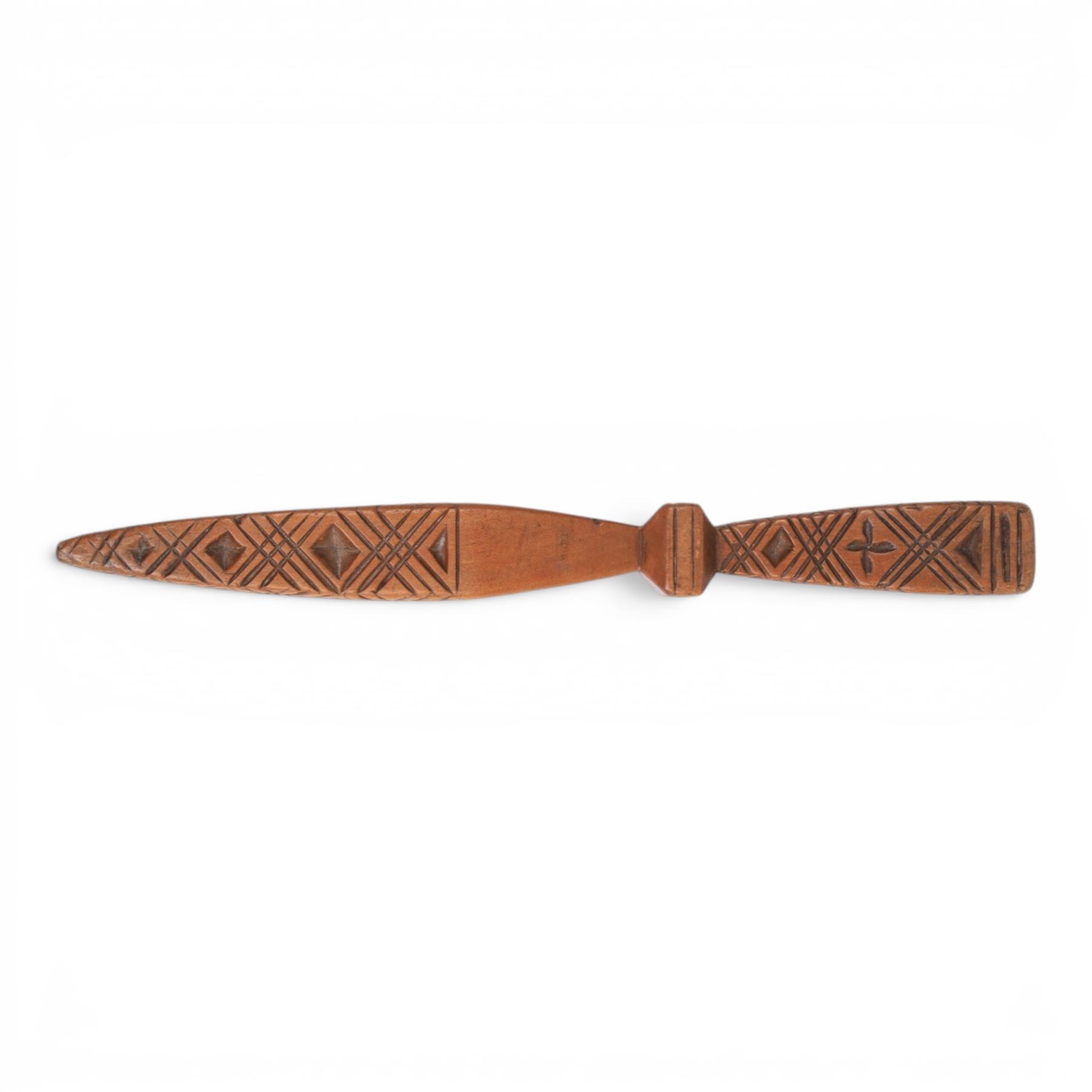 19th Century fruitwood goose-wing knitting sheath, decorated with geometric patterns, with a inset bone bust initialled A.B, together with a carved peg knitting stick, sheath L26cm