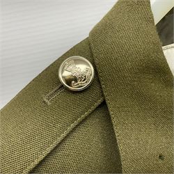 Two post-WWII British Army No.2 Dress tunics, one with Green Howards buttons; army shirt dated 1951; Royal Fleet Auxilliary jacket with trousers; three RAF/WAAF uniforms and RAF Greatcoat; and three canvas/webbing bags, two dated 1943 & 1945