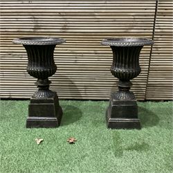 Pair of small Victorian style bronzed garden urns, on plinth bases - THIS LOT IS TO BE COLLECTED BY APPOINTMENT FROM DUGGLEBY STORAGE, GREAT HILL, EASTFIELD, SCARBOROUGH, YO11 3TX