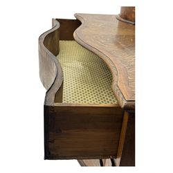 Late 19th century continental oak commode, serpentine fronted with parquetry and crossbanded decoration, the raised superstructure back fitted with a central bank of five recessed drawers flanked by concave drawers, above three full-width drawers with brass ring handles, raised on cabriole supports