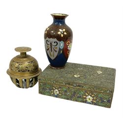 Cloisonné baluster shaped vase with decorated with shield shaped panels containing butterflies and flowers on a dark blue ground, together with an engraved brass bell and a Chinese cloisonné box