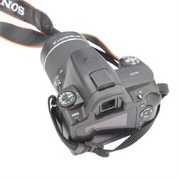 Sony A290 DSLR camera serial no. 5315268, with three Sony lenses including F4.5-5.6 75-300mm, boxed, DT F4-5.6 55-200mm lens and a F3.5-5.6 18-55mm lens, together with various accessories including a Ye Digital Remote Control, Manfrotto Element Monopod, Tamron F/3.5-6.3 lens, three Lowepro camera bags and two digital photography camera guide books
