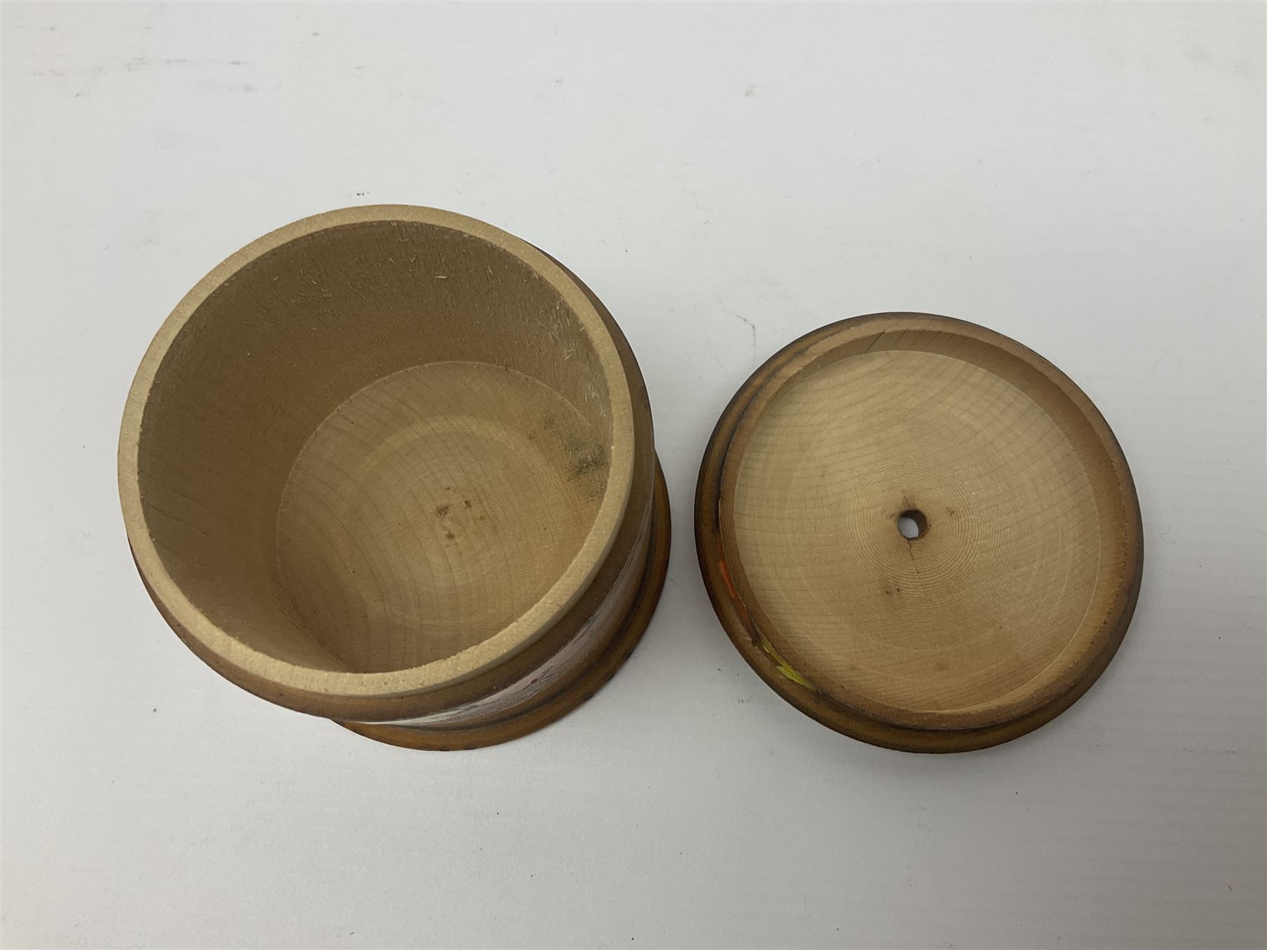 1930s pokerwork string dispenser, with tricoloured abstract decoration and 'Here's the String' to cover, H8cm