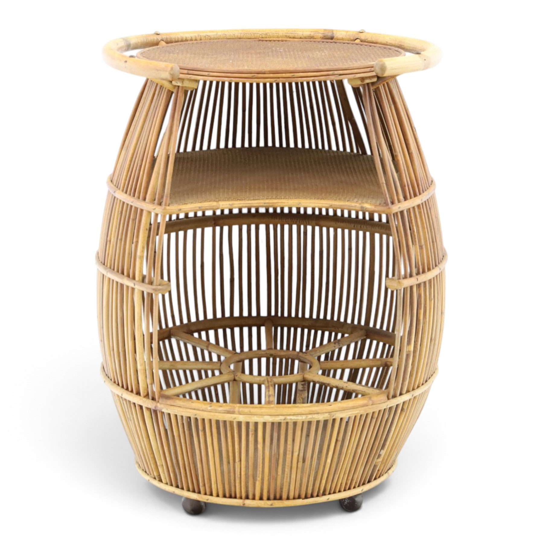 Italian mid-20th century barrel-shaped bar cart in rattan and bamboo, the circular top with rattan and bamboo handle, above a rattan shelf with bamboo bottle dividers below, raised on castors