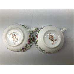 Minton Haddon Hall pattern tea set, comparing teapot, two tea cups and saucers (5)