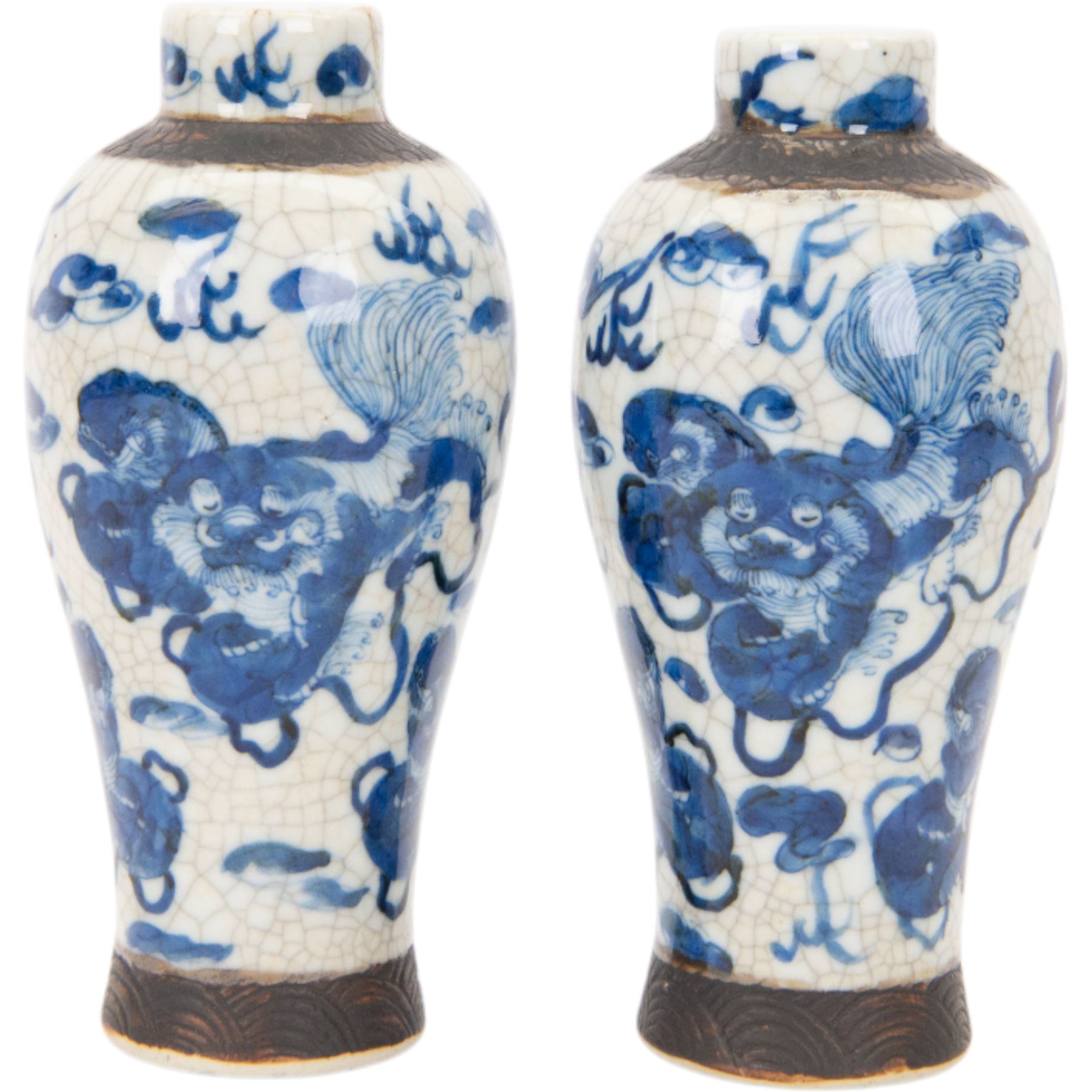 Pair of 20th century Chinese crackle glaze vases, of baluster form, decorated with dogs of foo amongst clouds, H23cm