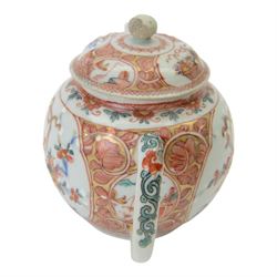 Amsterdam bont teapot, decorated with a basket of flowers, together with two Amsterdam bont saucers of similar design and five other saucers  