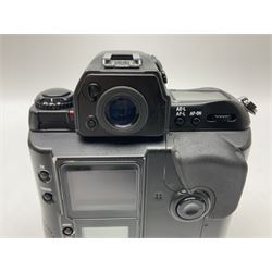 Canon EOS 1n Digital camera body, serial no. 260436, with 'Canon Zoom Lens EF 35-80mm 1:4-5.6 II Canon Inc. 52mm' lens, Kodak Professional DCS 520 digital module, and charger, serial no. K520C03165, together with Nikon F5 camera body with Kodak Professional DCS 760 digital module and charger, serial no. K760C03802