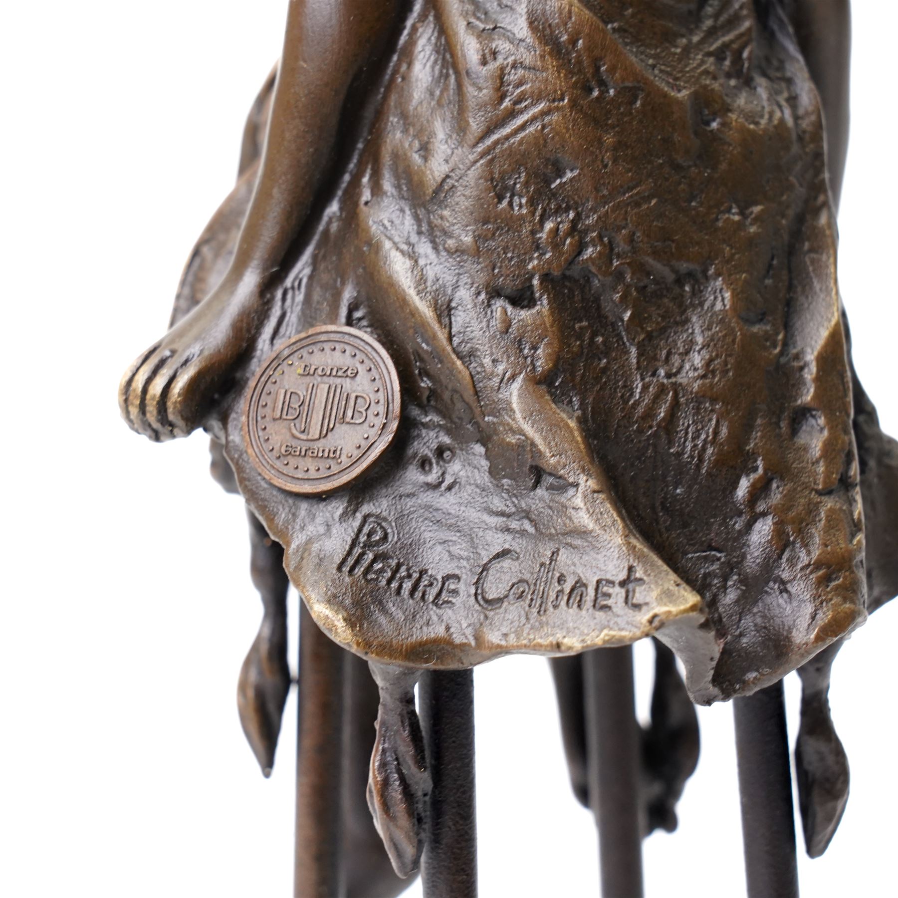After Pierre Collinet - bronze modelled as a semi naked female figure, seated upon a chair, H27cm