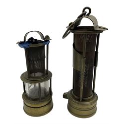 Two mining lamps, including wire mesh three bar example and a wire mess and glass example 