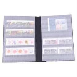 Queen Elizabeth II mint decimal stamps in one folder, face value of usable postage approximately 650 GBP