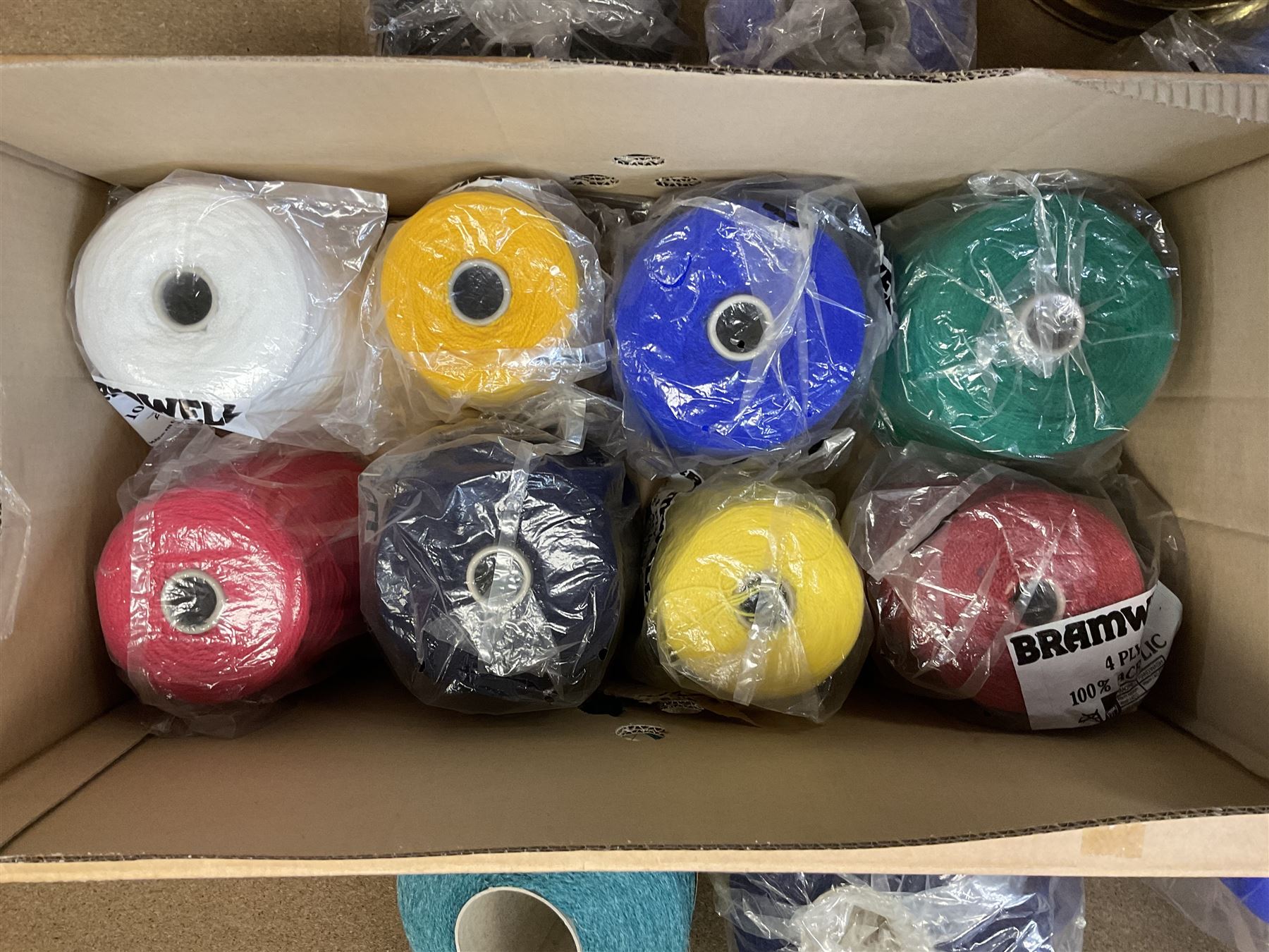  Brother cased knitting machine model KH-890 together with Brother Ribbing attachment model KH-850, knitting machine yarn cones in assorted colours, selection of knitting patterns etc