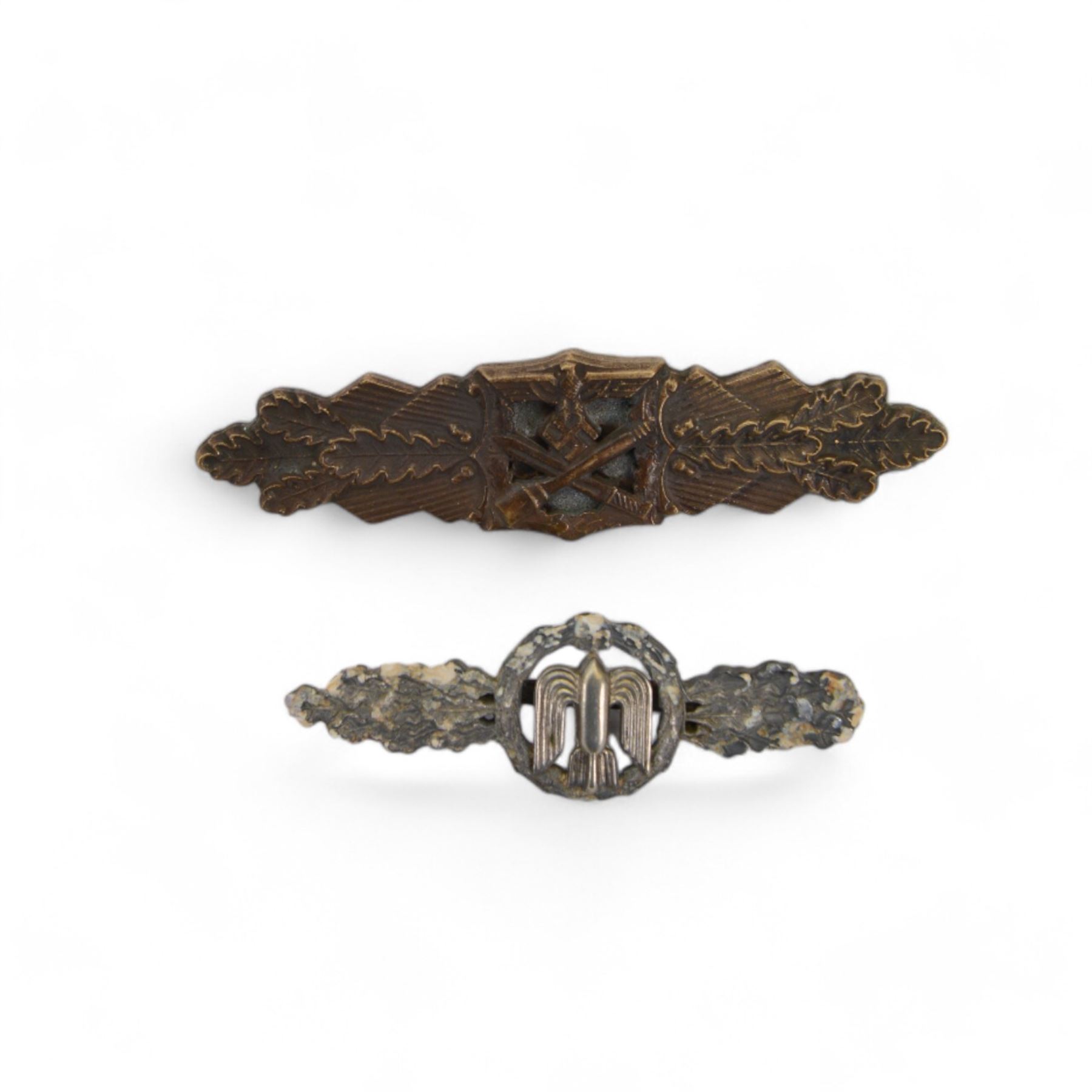 Eight German style badges including Bombers piolet clasp, Proficiency Rune, German Cross in gold etc 