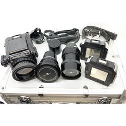 Zenza Bronica S2A medium format camera body, with Zenza Bronica Zenzanon MC '1:2.4 f-80mm' lens, together with Nippon Kogaku Nikkor-P '1:4 f-200mm' lens, Nikkor D.C '1:4 f-40mm' lens, two film backs and other camera equipment, housed in a hard flight case