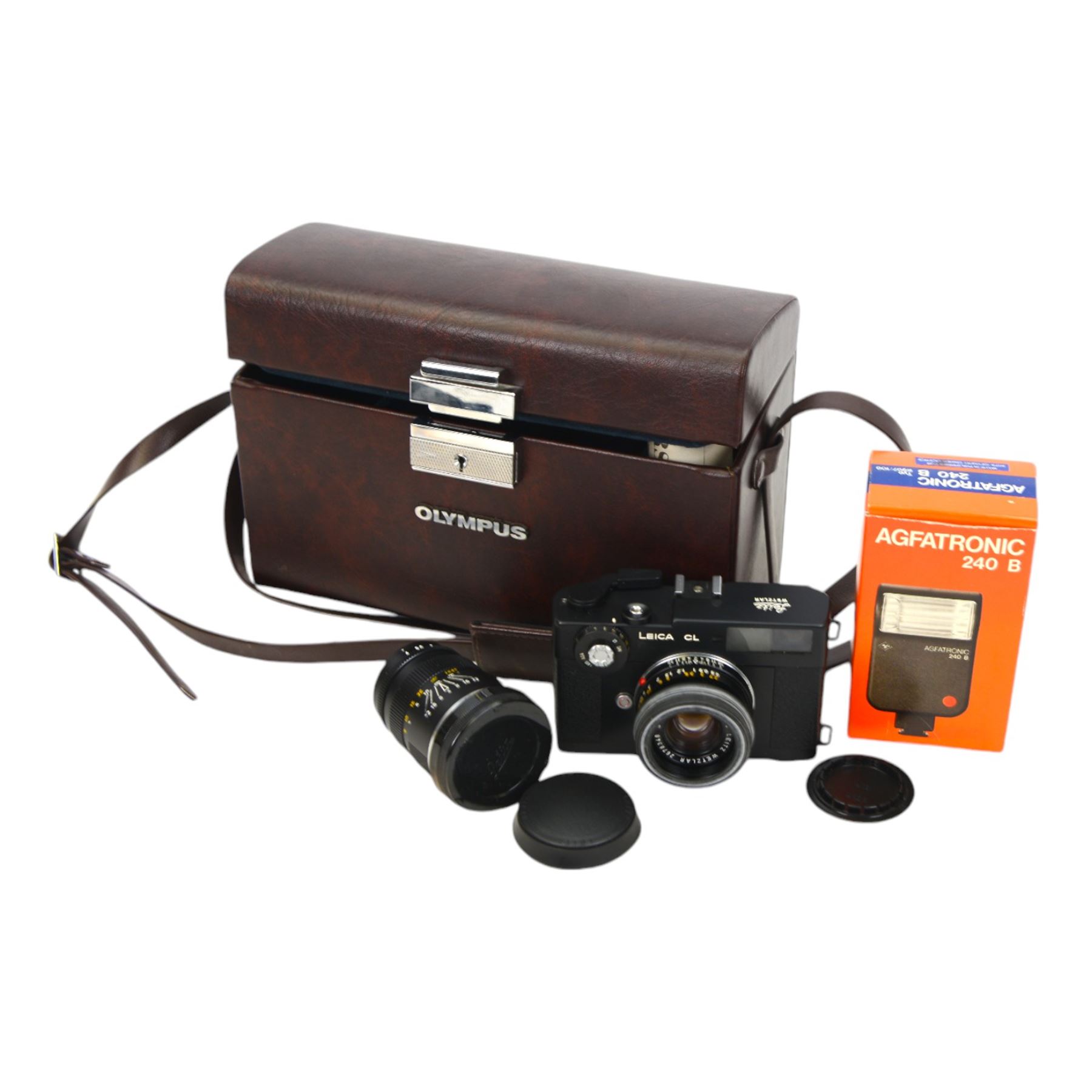 Leica CL camera body serial no. 1409019, with instruction booklet, two Leitz Wetzlar lenses to include a Summicron-C 1:2/40 lens serial no. 2678348 and an Elmar-C 1:4/90 lens serial no. 2647811, an Agfatronic 240 B flash and a Clampette, all contained within an Olympus carry case
