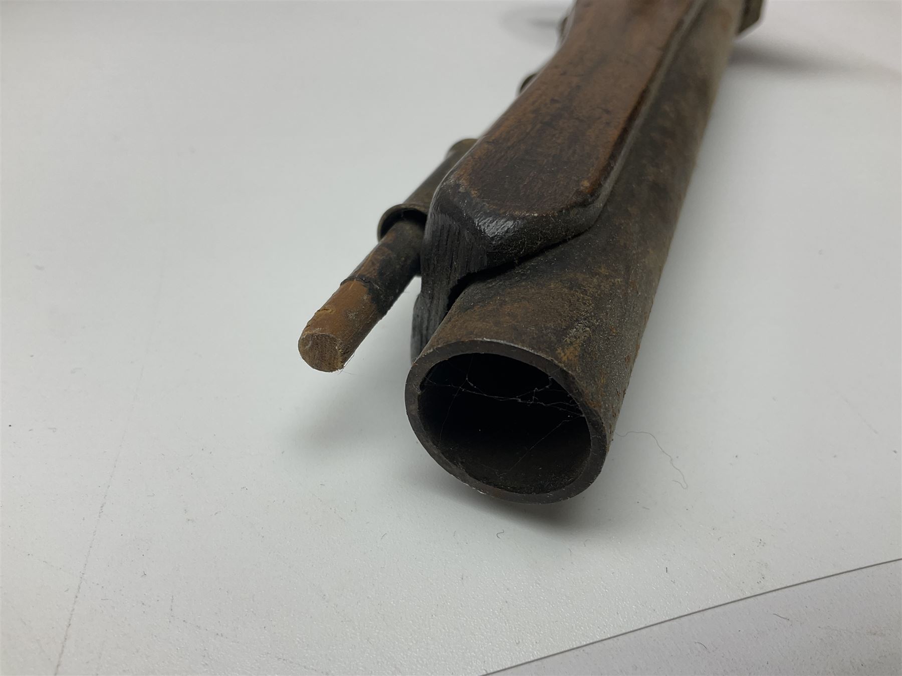 Leather covered swagger/sword stick with 40cm steel blade L62cm overall; another ash sword stick with 30cm diamond section steel blade; pair of fencing foils, the blades marked Solingen; two reproduction flintlock pistols; and 92cm inert cartridge belt (7)