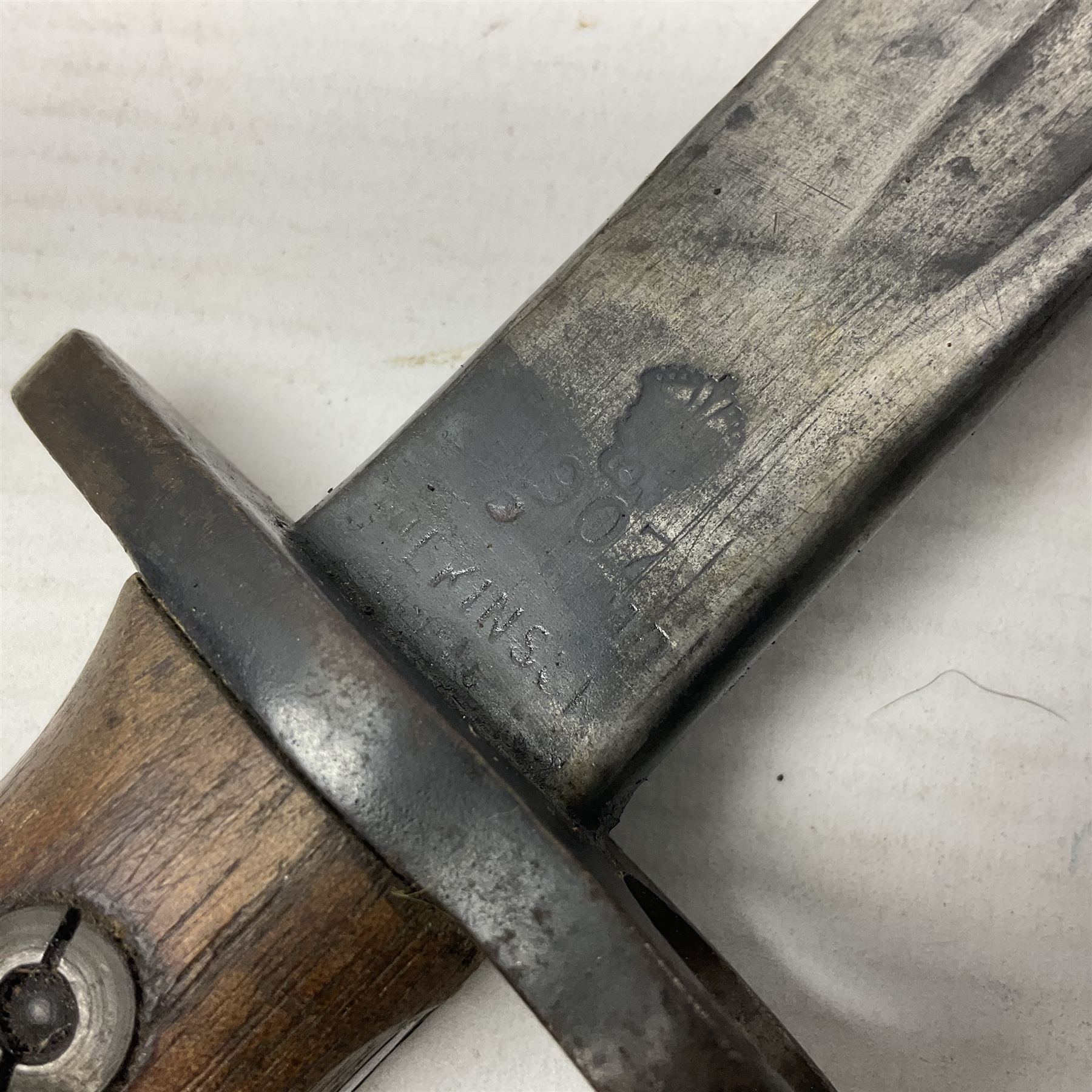 WWI British 1907 pattern bayonet, the 43cm fullered blade by Wilkinson with various marks to the ricasso; in leather covered scabbard numbered 294 to the throat and stamped M/58 L58.5cm overall