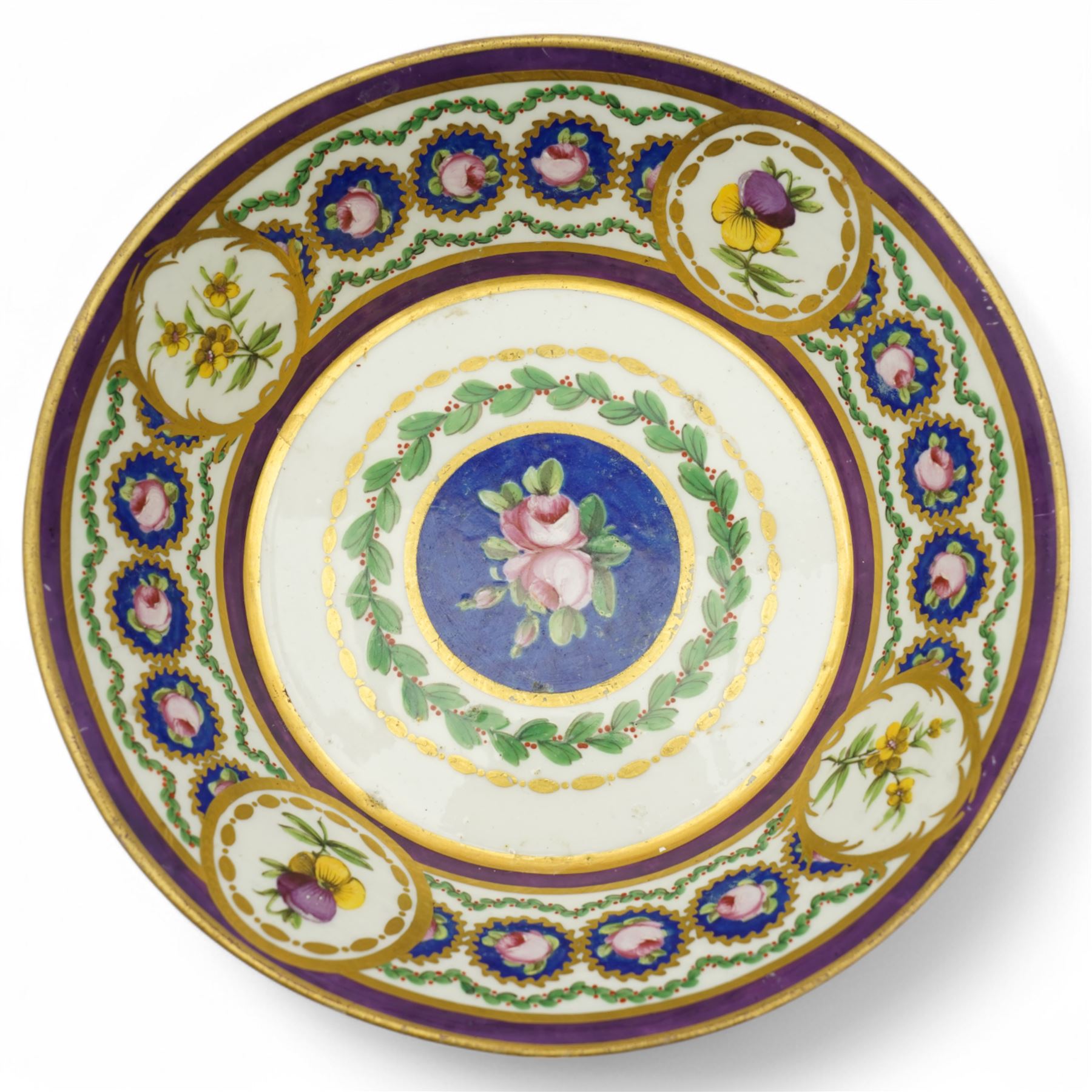 19th century Sevres type floral painted bowl with panels of flowers interspersed with small panels of pink rosebuds surrounded by trailing leaves D20cm with Sevres mark to base