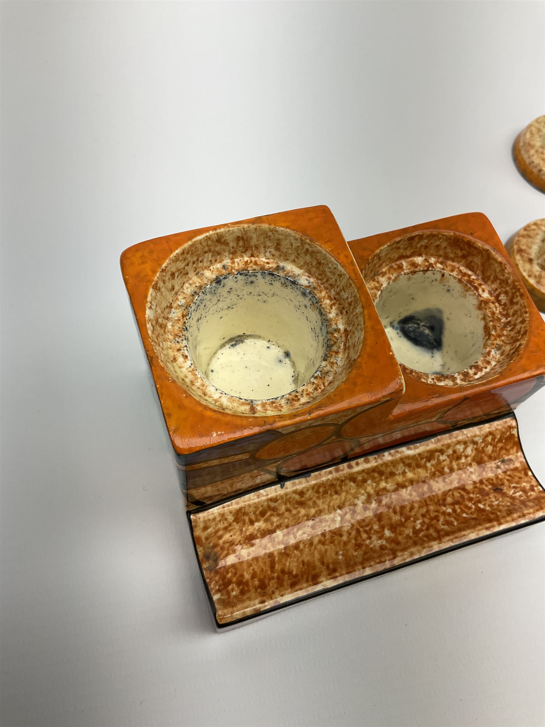 A Clarice Cliff Bizarre Cafe au lait double cube inkwell with pen tray, decorated in the Berries pattern, with printed mark to base, and shape number 462, H7cm W10cm. 