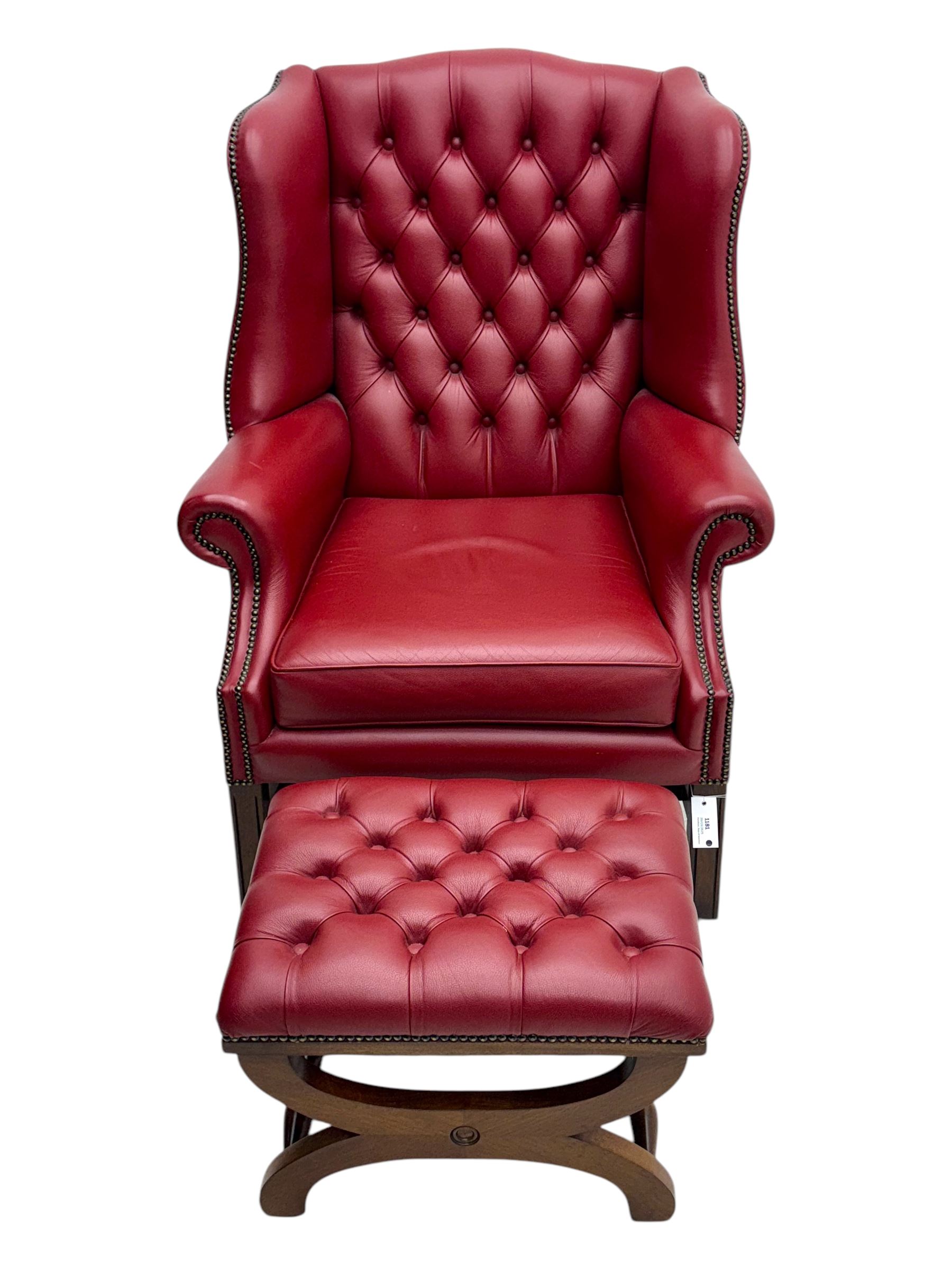 Kingsgate - contemporary 'Suffolk' wingback armchair and matching stool, upholstered in red leather with deep button tufting and brass stud trim, raised on square section supports 