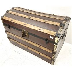 Wood bound dome top travelling trunk, single hinged lid 