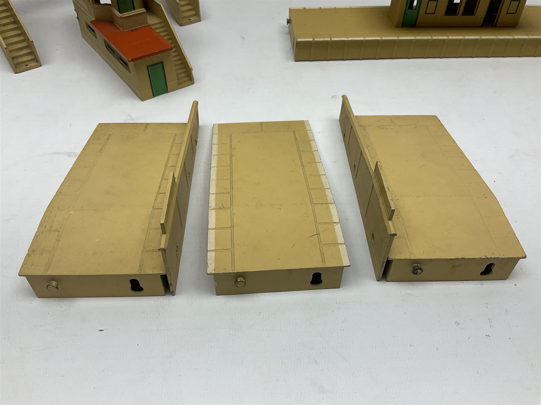 Hornby Dublo - two stations, signal box, 3-piece platform, footbridge, girder bridge etc; and other die-cast trackside and station accessories; all unboxed