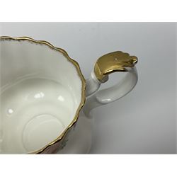 Royal Albert Old Country Roses pattern tea set, comprising teapot, coffee pot, six teacups and six saucers, five side plates, further teacup with joined saucer and side plate, open sucrier, milk jug, cake plate, and preserve pot and cover, together with Royal Albert Jubilee Rose pattern sauce boat and stand, and Royal Albert Lavender Rose pattern cake stand. 