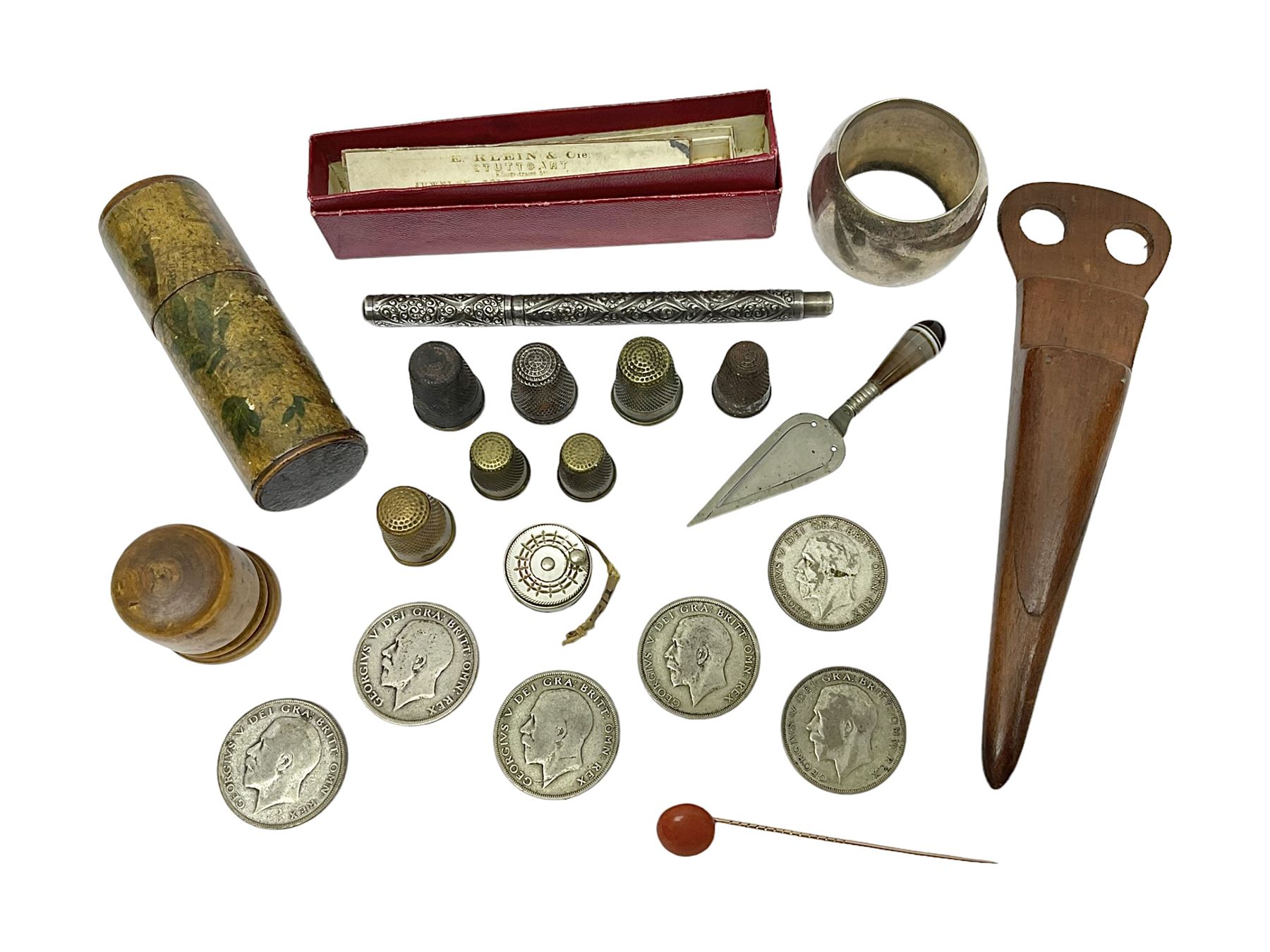 14ct gold coral stick pin, together with six pre-1947 silver halfcrown coins, silver napkin ring, silver mounted pen and other collectables