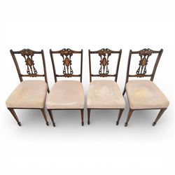 Quality Edwardian seven piece inlaid salon suite, comprising three seater settee, pair of arm chairs and four chairs with pierced splat backs, upholstered in pale pink fabric, inlaid with flowering urns, upon tapering legs with spade feet and castors